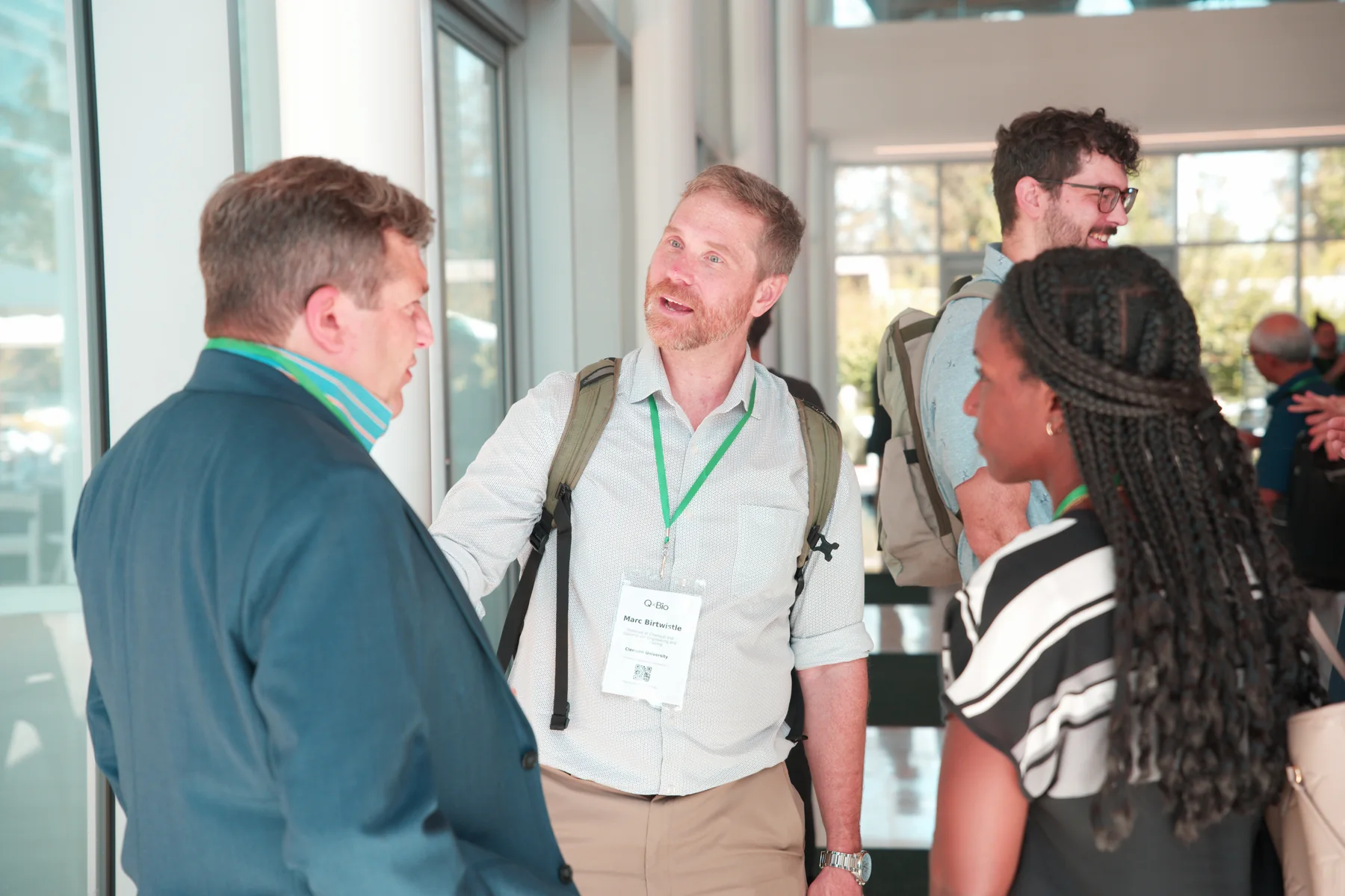 Researchers connecting during QxBio
