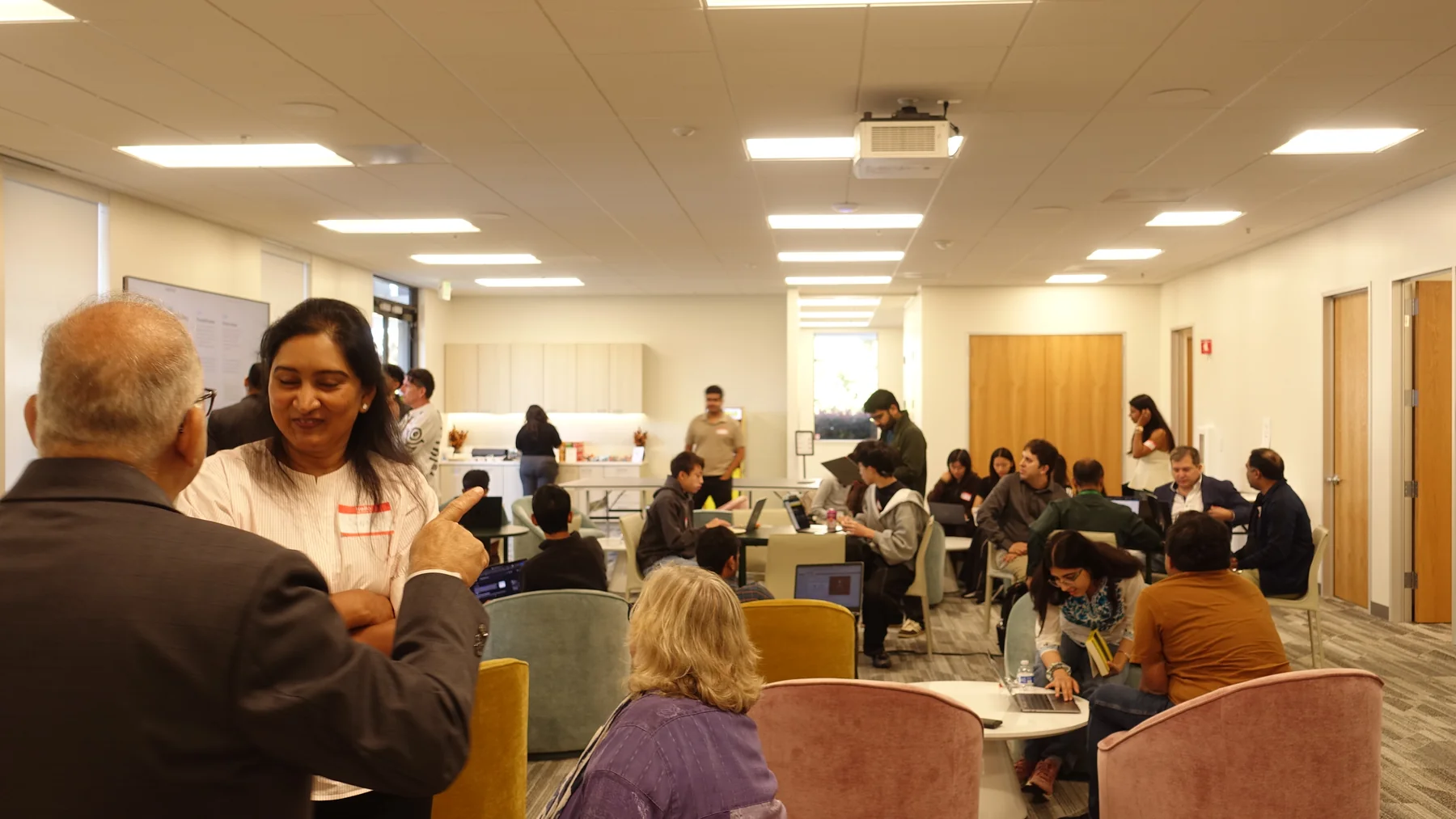 Students building AI agents at the QxBio hackathon